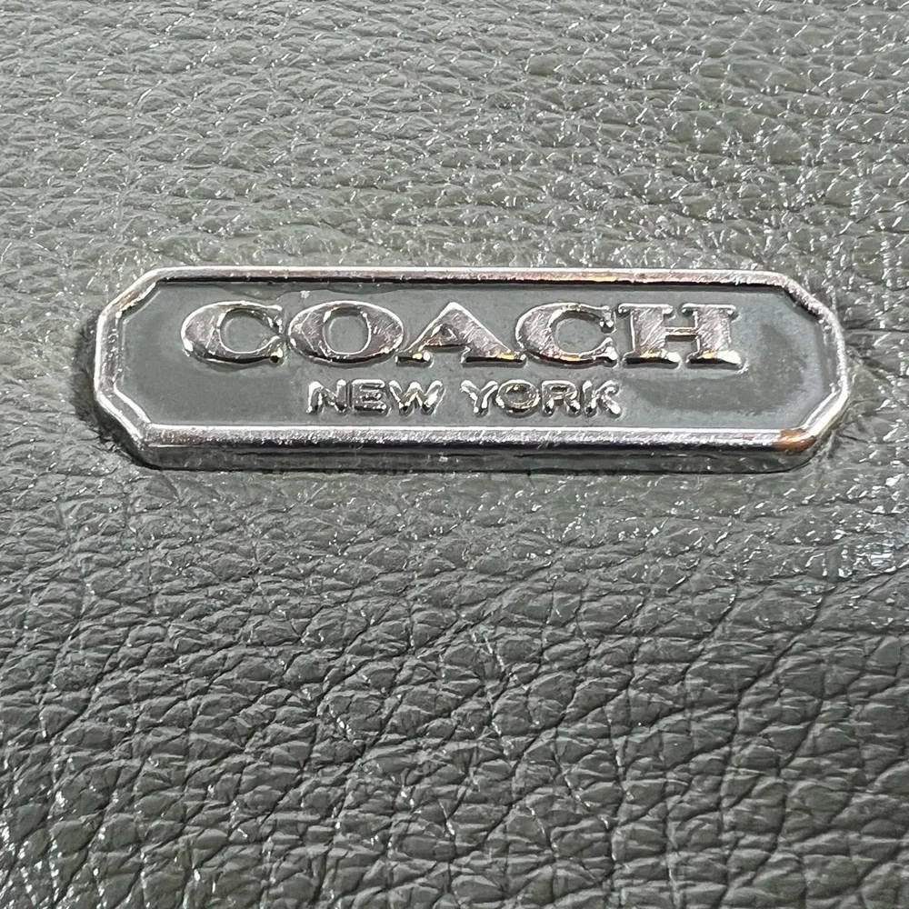 4019: Coach Olive Green Pebbled Leather Drawstring Backpack
